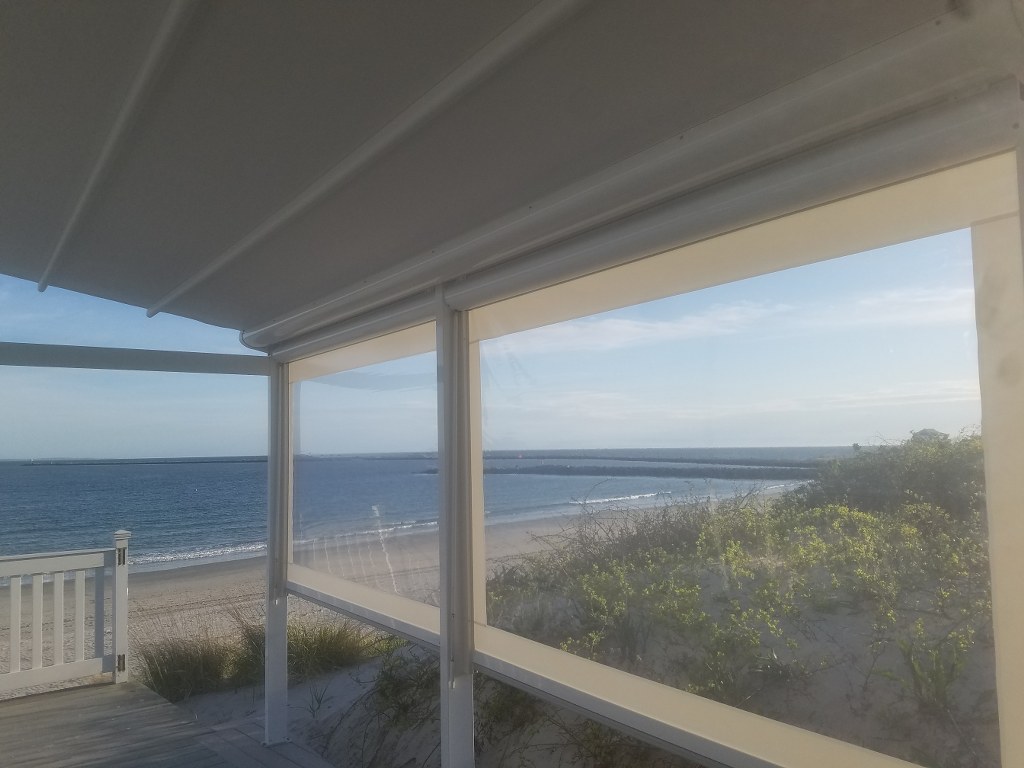 Custom-Palladia-with-Clear-Vinyl-Screens-at-Galilee-Beach-Club-by-New-Haven-Awning-(2).jpg
